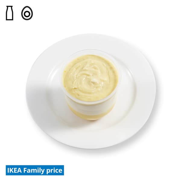 IKEA Singapore Family Food offers at Swedish Restaurant — D24 Durian mousse in a cup on a white side plate. Food allergen symbols of dairy and egg in black on the top left-hand. The IKEA Family price tag is displayed in blue and white text, positioned at the bottom left of the image.