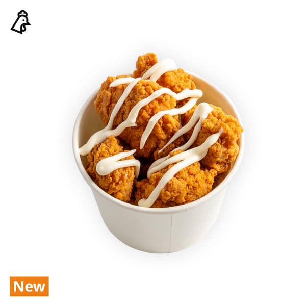 IKEA Singapore's Swedish Bistro Food — Fried crispy chicken in a cup. On the top left corner, food allergen chicken symbol in black is seen.