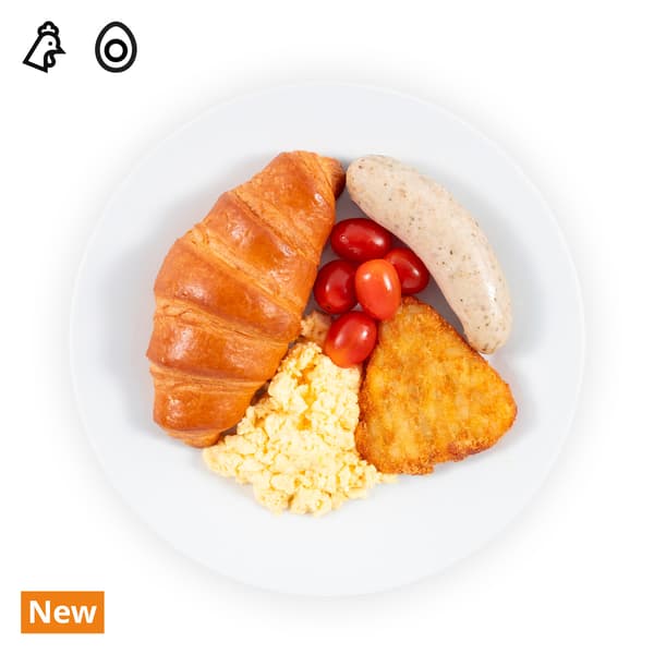 IKEA Singapore's Swedish Restaurant's breakfast — Breakfast platter; Butter croissant breakfast platter with pork bratwurst, butter croissant, scrambled egg, hashbrown and cherry tomato. A pork and egg food symbol is seen on the top left corner.