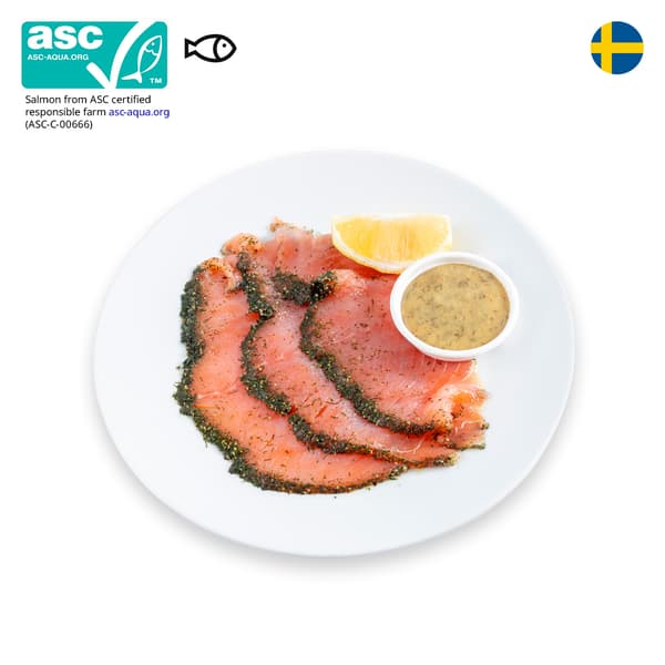IKEA Singapore's Swedish Restaurant's cold dishes — Marinated salmon with a wedge lemon. An ASC certificate with a fish food allergen symbol in black on the top left corner.