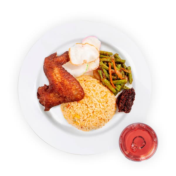 IKEA Singapore's Swedish Restaurant's daily saver meal — Nasi goreng with chicken wing, keropok crackers, stir-fried long beans, sambal chilli and refillable cold drink with chicken food symbol in black on the top left corner.