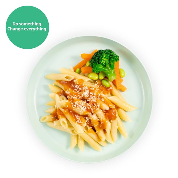 IKEA Singapore's Swedish Restaurant's kids' plant-based menu — Kid's organic penne pasta with mixed vegetables in tomato sauce. A sustainability communication on the top left corner overlaying image in green with white text that reads 