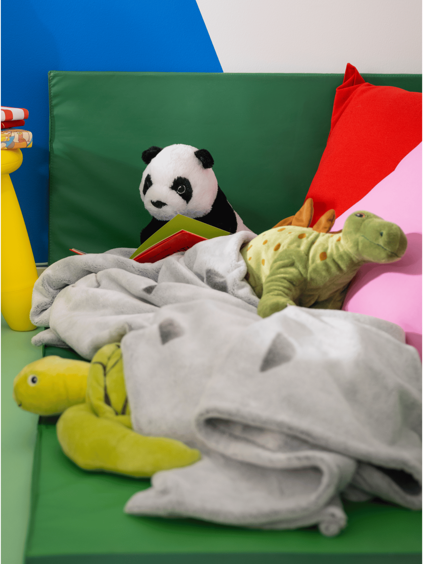 IKEA soft toys on a couch