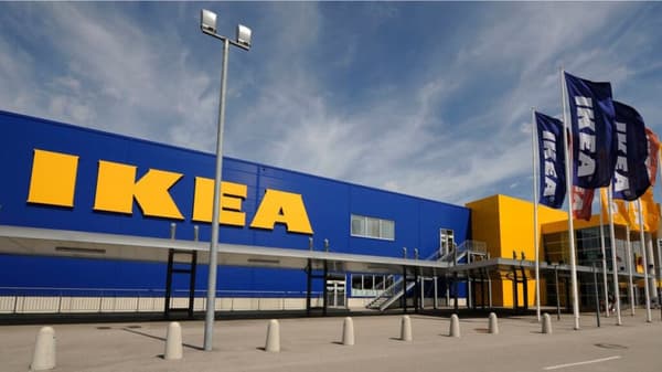 IKEA store Linz Haid with yellow and blue facade in front of a clear blue sky