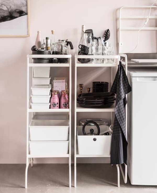 IKEA SUNNERSTA utility cart in white made of steel and powder coating, IKEA KUGGIS box with lid in white plastic.