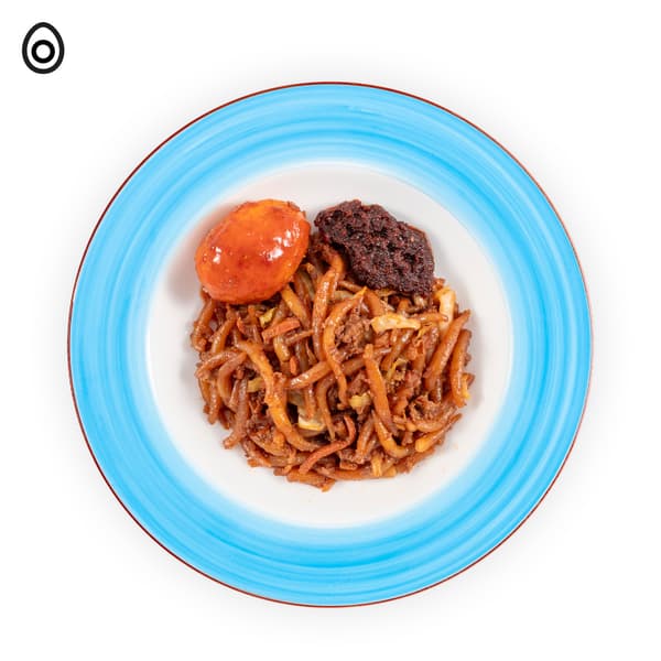 IKEA Tampines Halal Restaurant's April weekend local breakfast — Mee tai Bak with sambal egg and sambal chili served at the side. An egg food symbol in black on the top left corner.