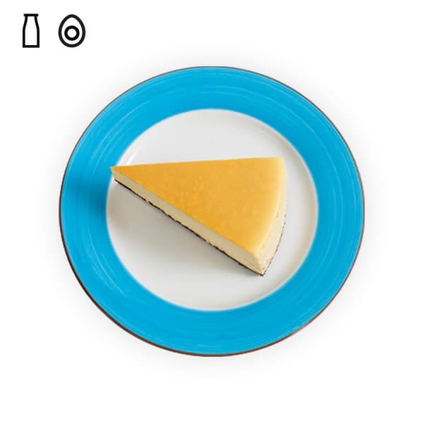 IKEA Tampines Halal Restaurant's desserts — A slice of Cheesecake with food allergens of dairy and egg in black on top left corner.