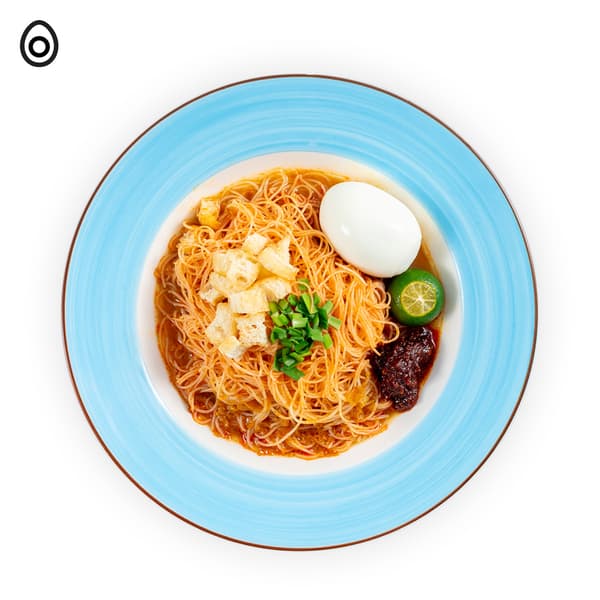 IKEA Tampines Halal Restaurant's July weekend local breakfast — Mee siam with egg and sambal chili served at the side. An egg food symbol in black on the top left corner.