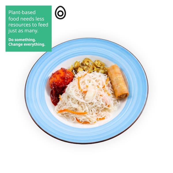 IKEA Tampines Halal Restaurant's weekend local breakfast — Stir fried bee hoon with spring roll and sambal egg. On the top-left corner of the image, there is a green overlay containing the following white text: 'Plant-based food needs fewer resources to feed just as many. Do something. Change everything', followed by an egg food symbol in black on the right.