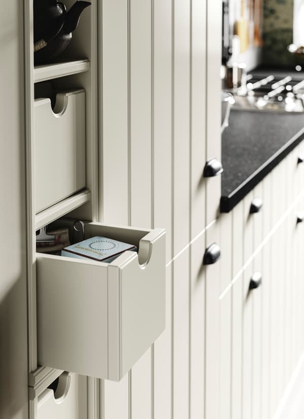 IKEA TORNVIKEN off-white kitchen storage box slid open.