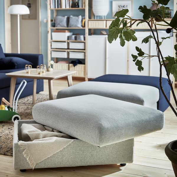 IKEA VIMLE footstools come with storage compartments underneath the soft cushioned seat module. Combine units for last-minute bench seating for guests!
