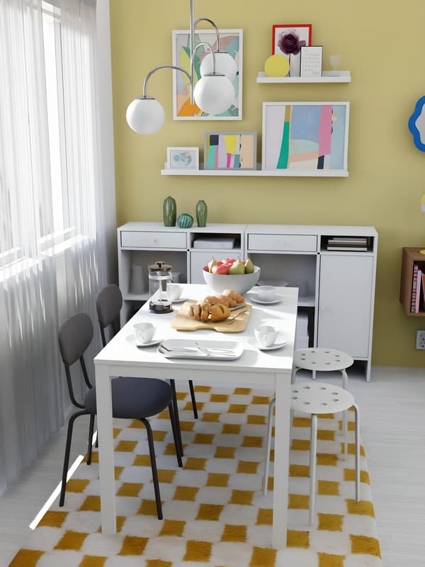 Image 3D d'une salle à manger intégrée dans un salon 