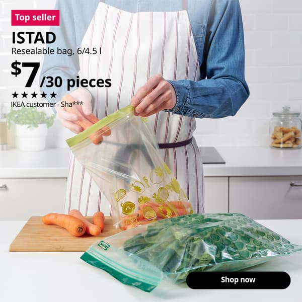 Image is set in the kitchen setting, a guy storing vegetables into ISTAD resealable bag. A “Lower price” tag appears on the image. Text reads: “ISTAD, Resealable bag, 6/4.5 l, $7/30 pieces.” Rated 5 stars by IKEA customer Sha***