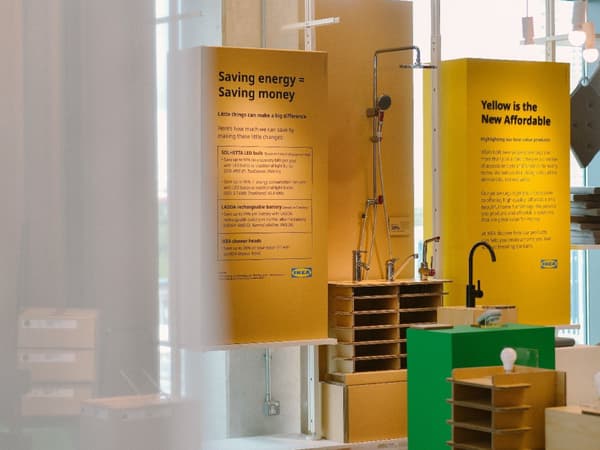 Image of IKEA store with a Saving energy = Saving money and Yellow is the New Affordability banner messaging