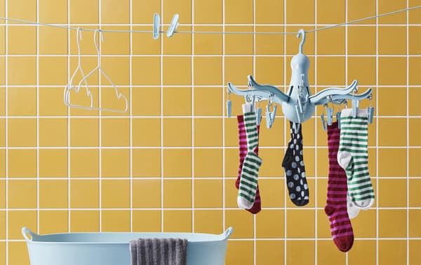 Image of socks on a PRESSA hanging dryer linking to IDEA: Small tips to reboot how you manage mess at home