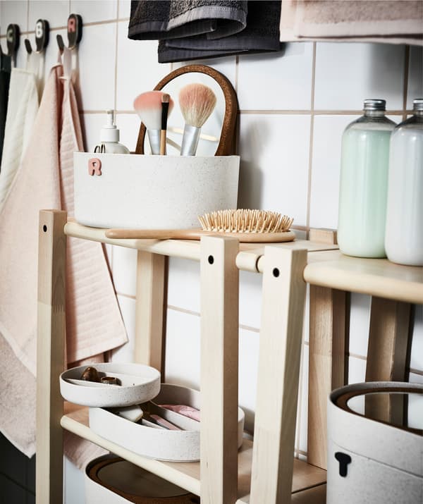 In a tiled bathroom – often small-space and where wall-securing can be hard – low, shallow shelves like VILTO are a lifesaver.