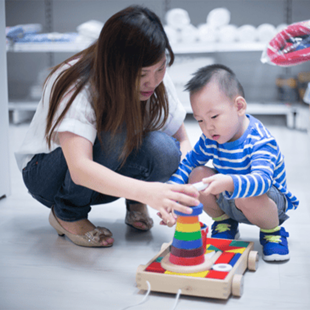 In store activities at IKEA Singapore, mother and child playing in the store