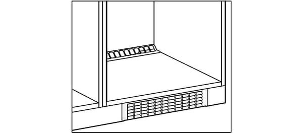 Installation of IKEA kitchen furniture ventilation grille.