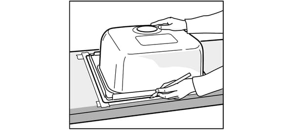 Installation of the IKEA kitchen sink.