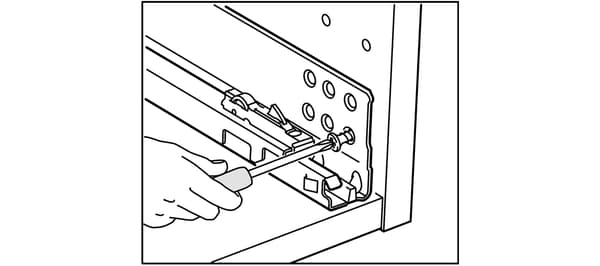 Installing IKEA kitchen slides.