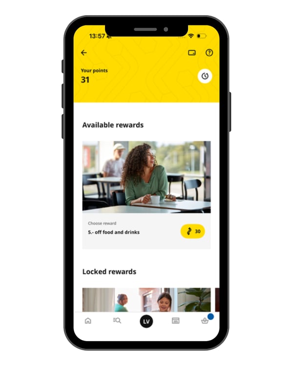 Instructions for finding your IKEA Family points in the IKEA app. Step 2 is to view your points and rewards.
