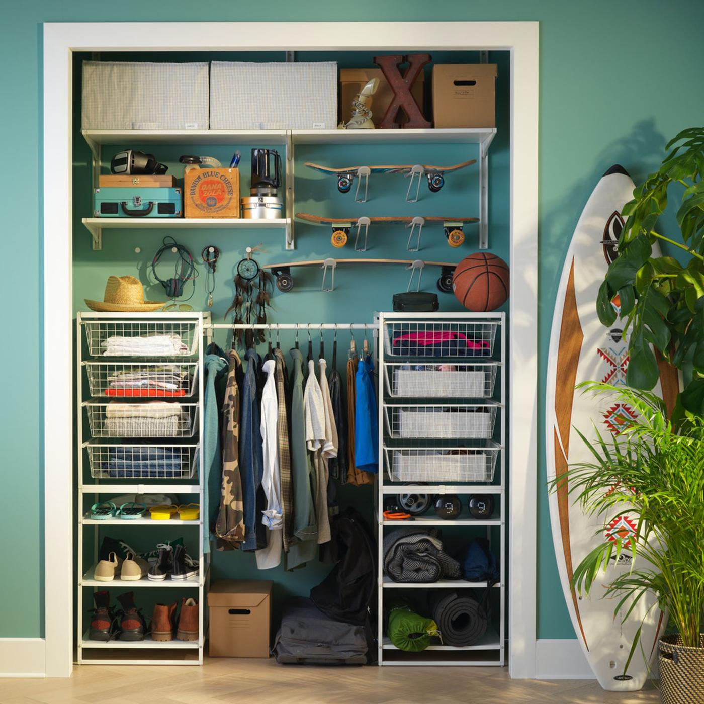 JONAXEL with clothes, skateboards and a surfboard