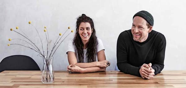 Julia and Andre at their dining table and TIDVATTEN vase accessory