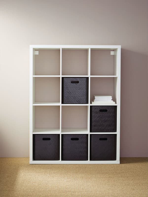 Kallax shelving unit with some brown boxes