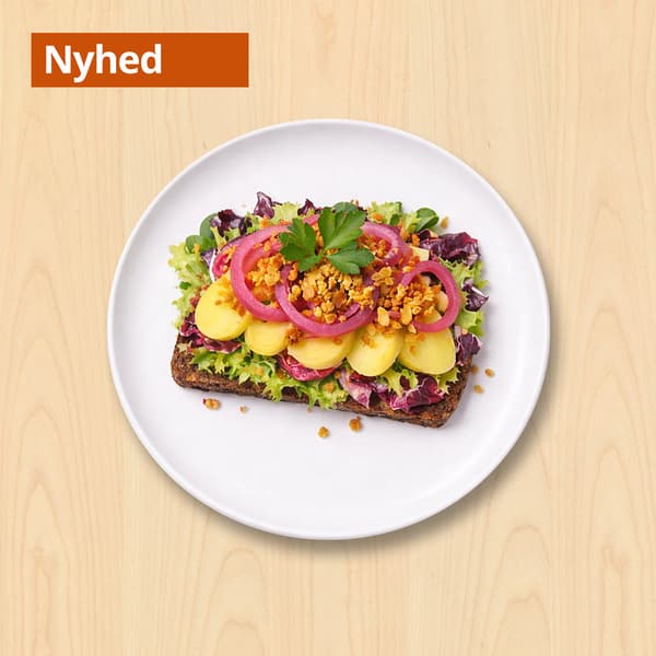 Kartoffelmad
Solsikkerugbrød med salat, kartoffel, plantebaseret mayonnaise, purløg, ristede løg og syltede rødløg

29.-