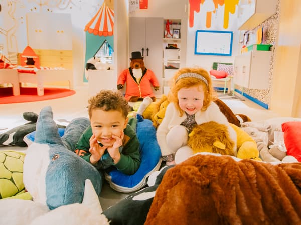 Kids having fun in a colourful playroom