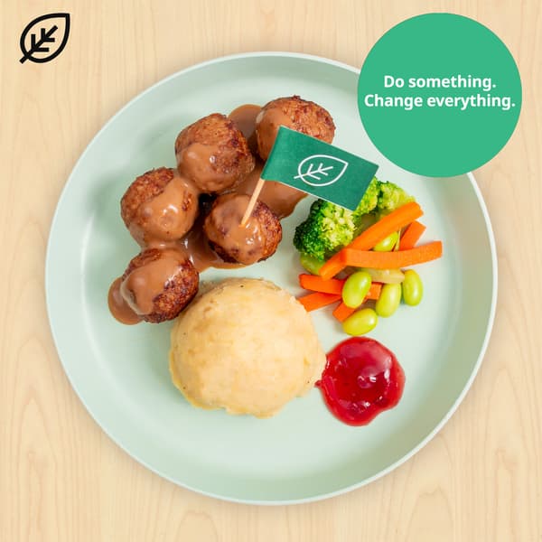 Kid's plant balls with mashed potato and a green flag with a leaf symbol on it. A green circle is shown on top right with the words 