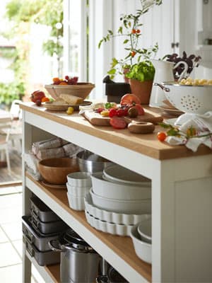 Kitchen island with open shelf for dishes 
