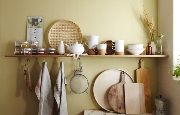 Kitchenware displayed on a shelf.