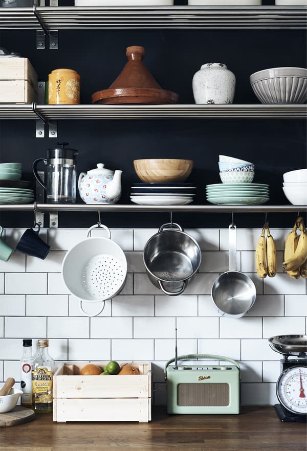 Kitchenware displayed on shelves.