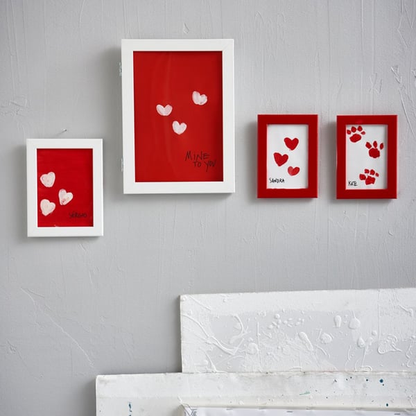Kjærlighet i ramme på veggen.