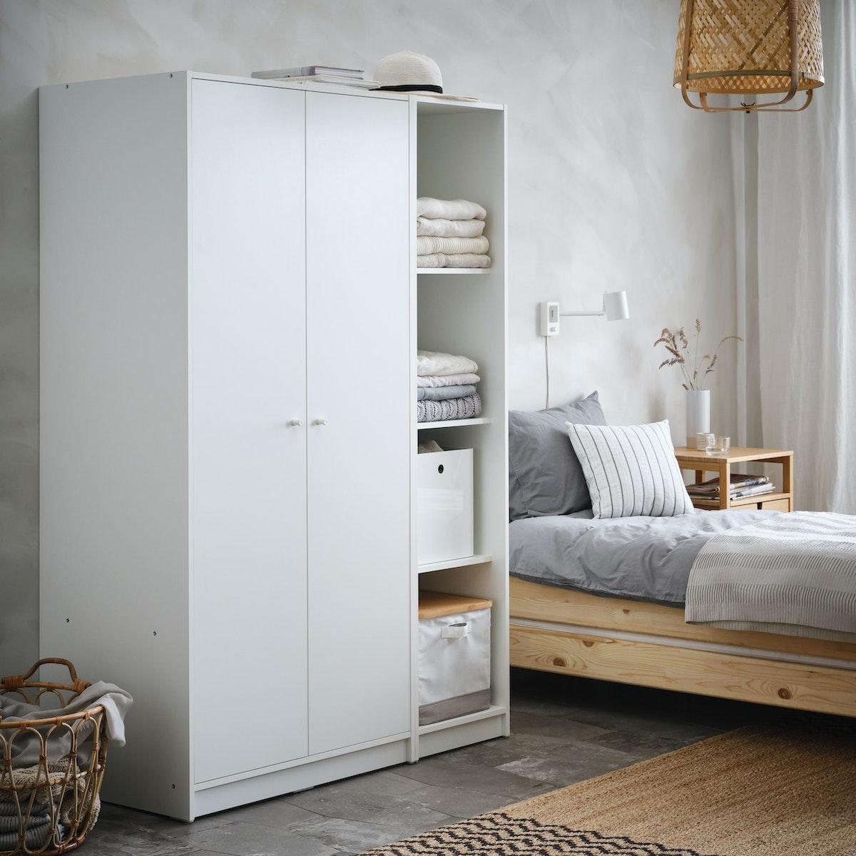 KLEPPSTAD storage wardrobe cupboard in the bedroom in white.