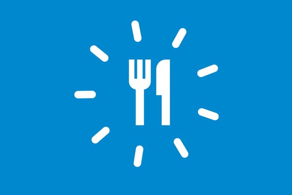 Knife and fork icon on blue background.