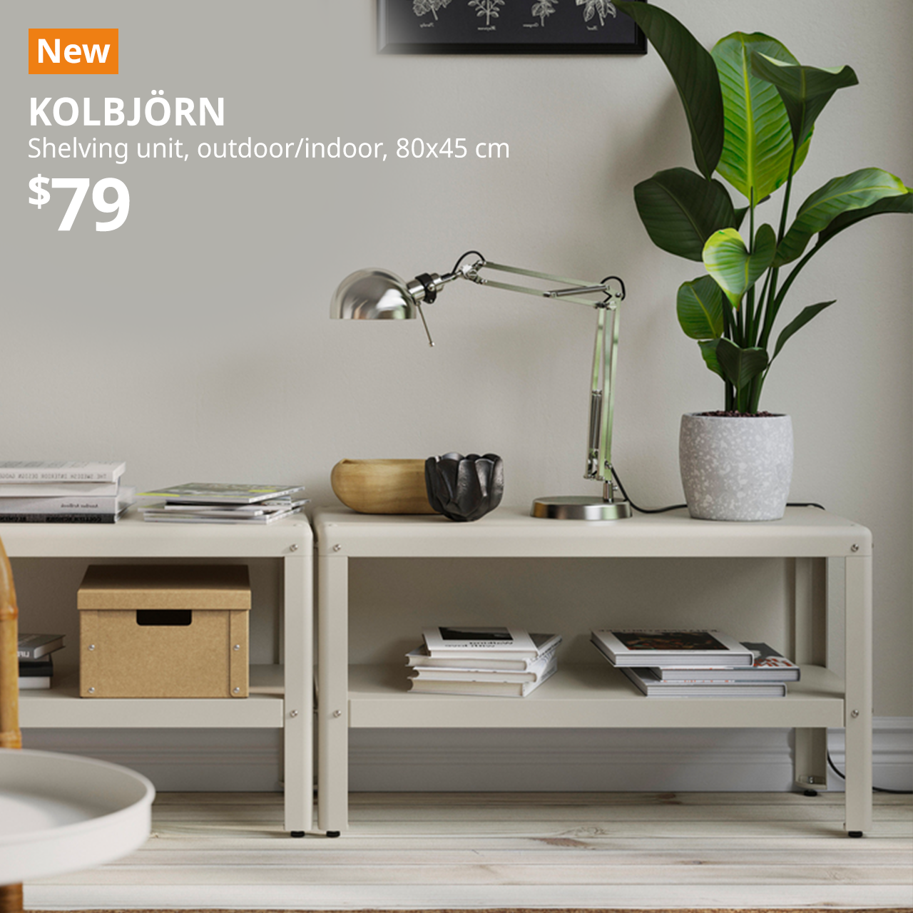 KOLBJORN shelving unit placed side by side, with a FORSA work lamp on top and books placed underneath the shelves in the living room area.Text on image reads New with a orange box, KOLBJORN, shelving unit, outdoor/indoor, 80x45 cm. 