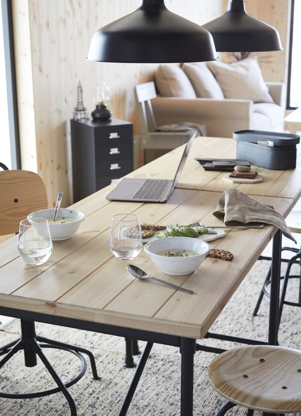 KULLABERG light pine wooden table set for eating.