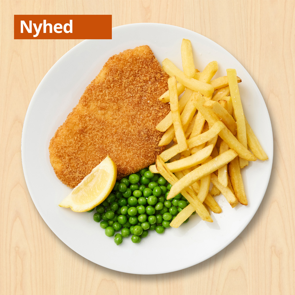 Kyllingeschnitzel
Paneret kylling med pommes frites, ærter og citron

89.-

+ bearnaisesauce 7.-