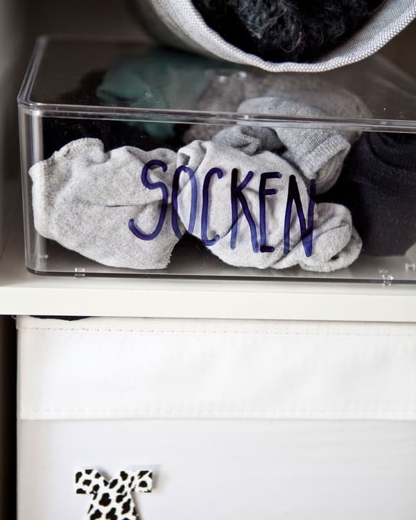 Label boxes of clothing for easy finding.
