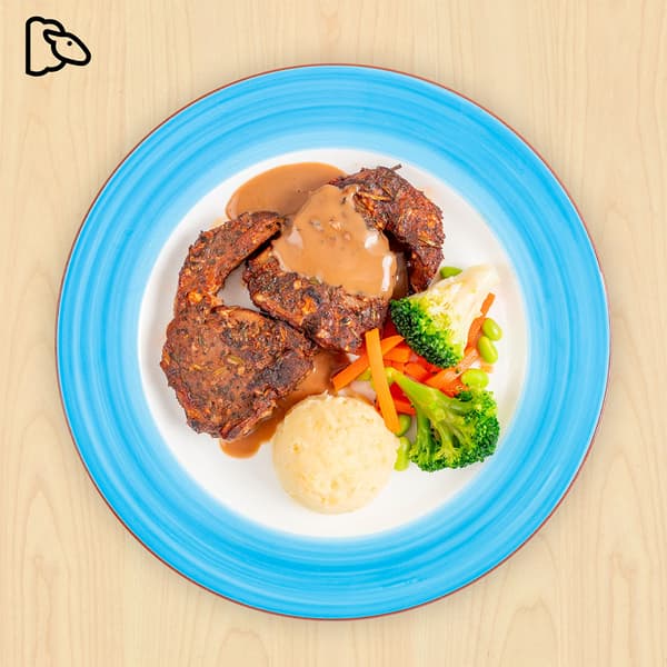 Lamb chop with mashed potato and mixed vegetables with green soya beans. 