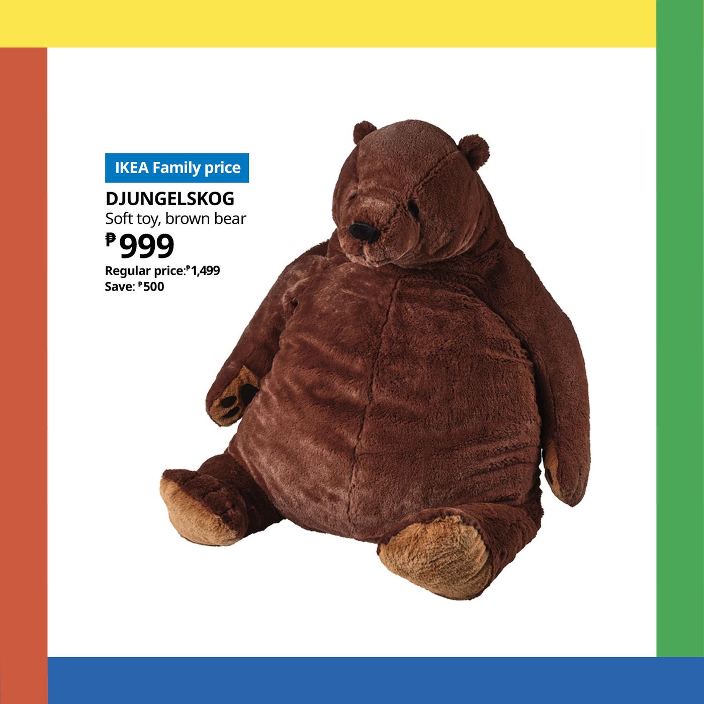 Large plush brown bear toy with a cuddly appearance is featured against a colorful background. Text promotes IKEA's sale price of ₱999, down from ₱1,499.