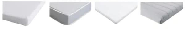 Las esquinas de cuatro colchones de cuna de IKEA diferentes uno al lado del otro.