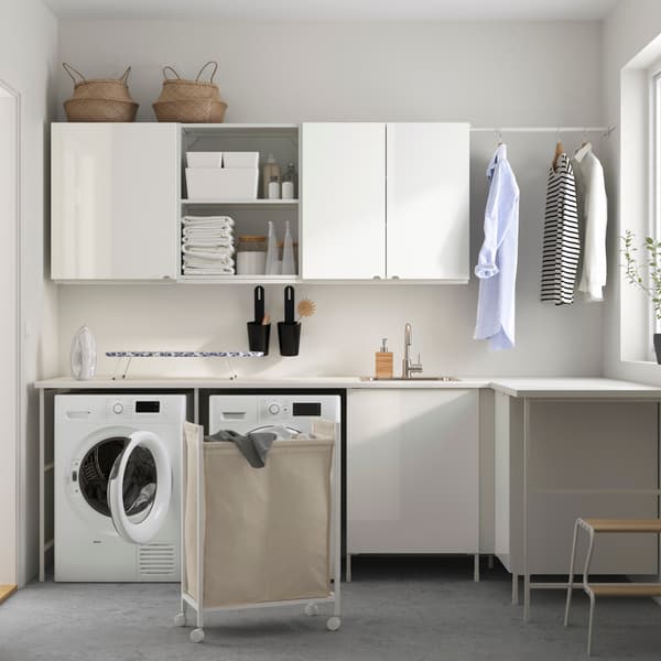Laundry room with IKEA furniture.