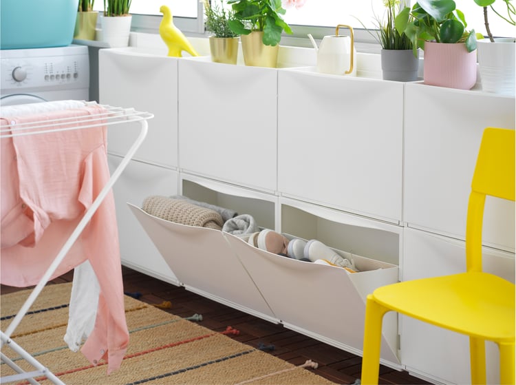 Affordable laundry room with JONAXEL shelving unit IKEA