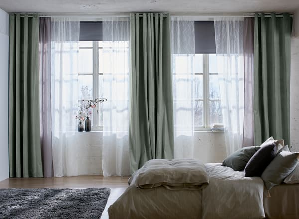 Layered SANELA and LILL curtains in a bedroom