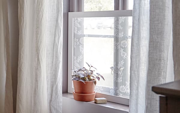 Let in light and keep out nosy neighbours with a quick curtain frame.