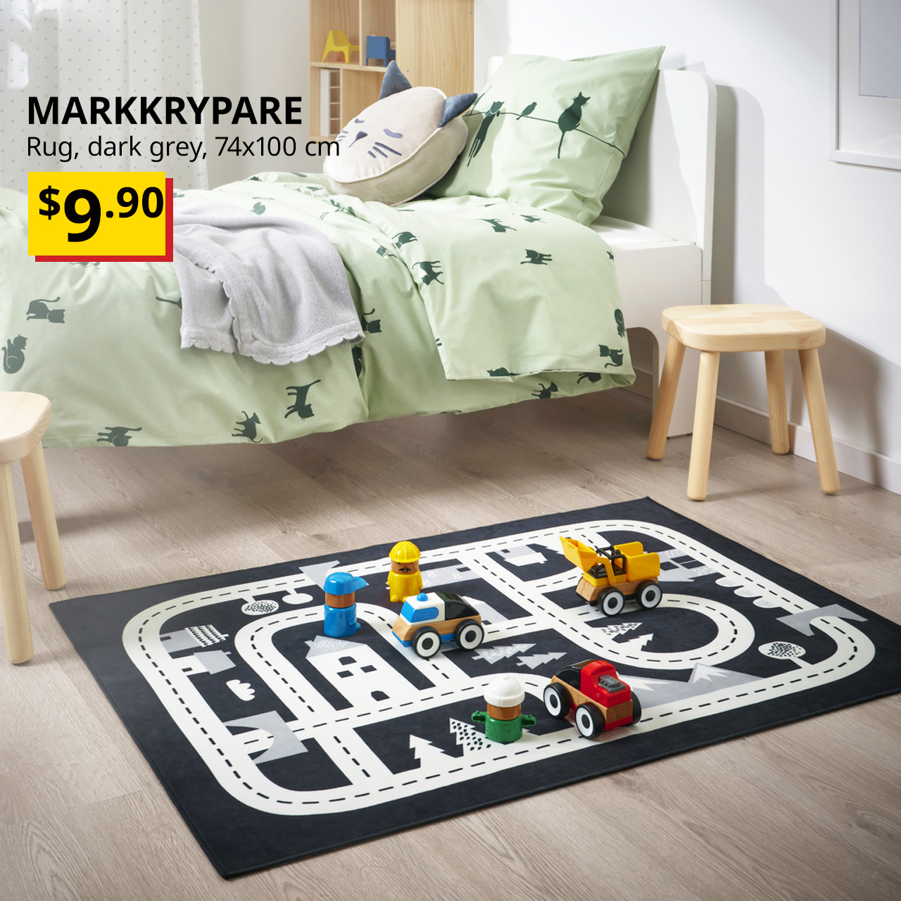 LILLABO train toy set placed on top of a MARKKRYPARE rug, dark grey, 74x100 cm, in children's room. $9.90