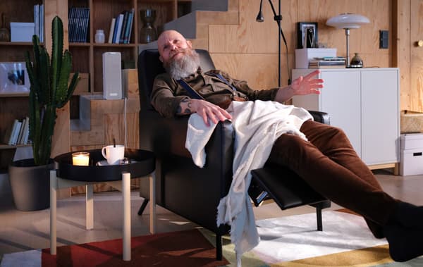 Link to 'At times, inner peace is just the right tune and a recliner away' - image of a man relaxing on a recliner.